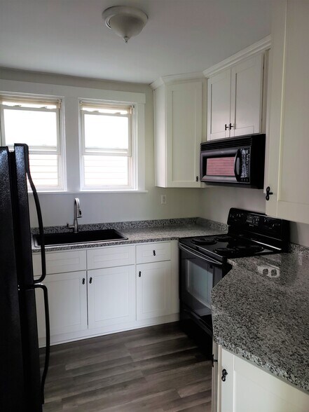 The newly remodeled modern kitchen - 201 Richbarn Rd
