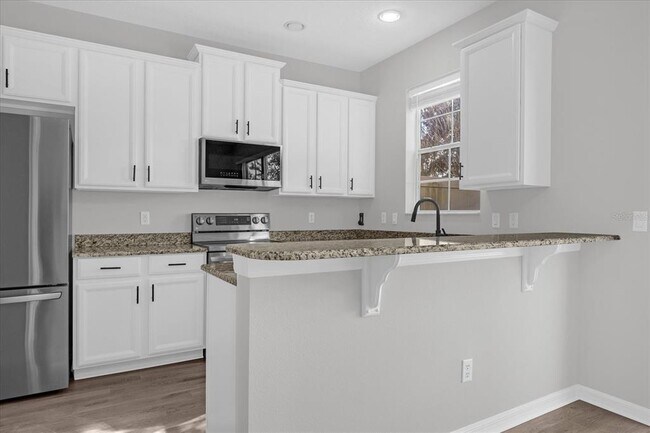 Building Photo - 9450 Silver Buttonwood St