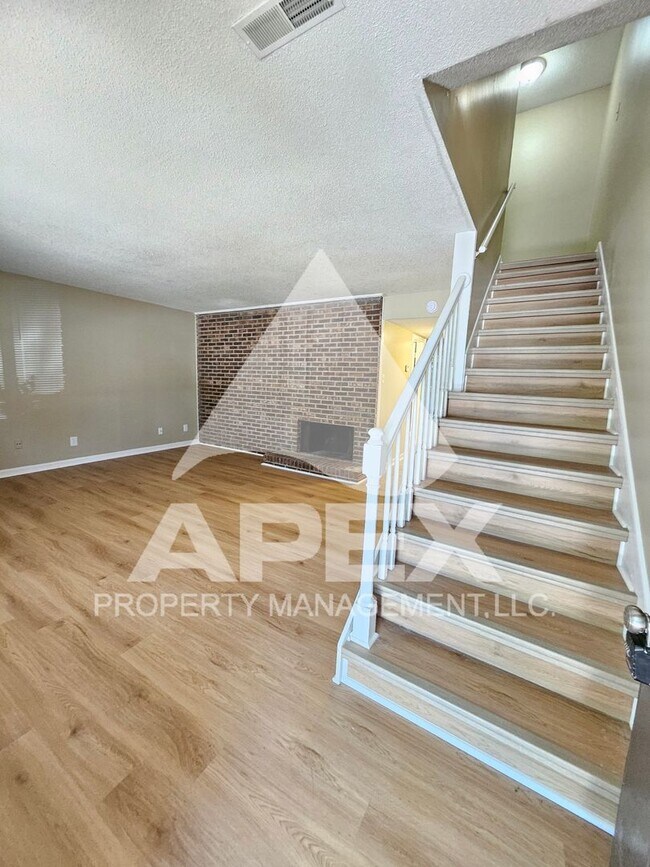 Building Photo - 9008-COU