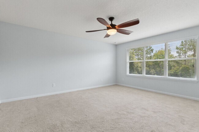 Building Photo - Spacious 4-Bedroom Home in Amelia Walk wit...