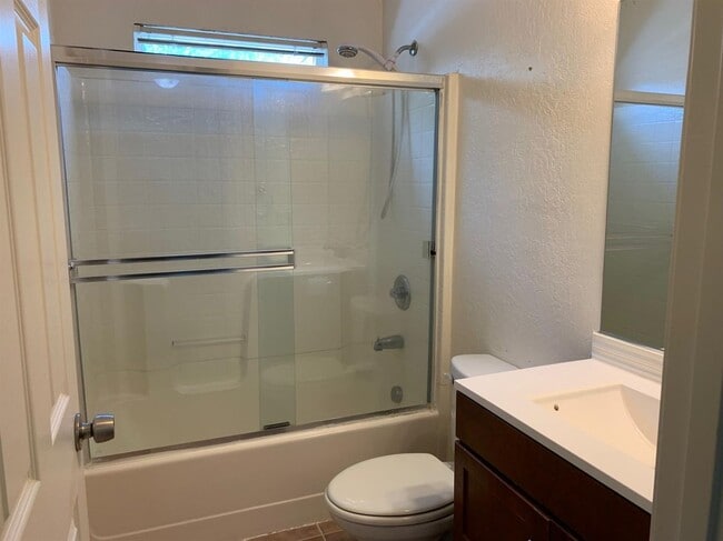 Building Photo - Enjoy the Backyard Pool at This 4-Bedroom ...