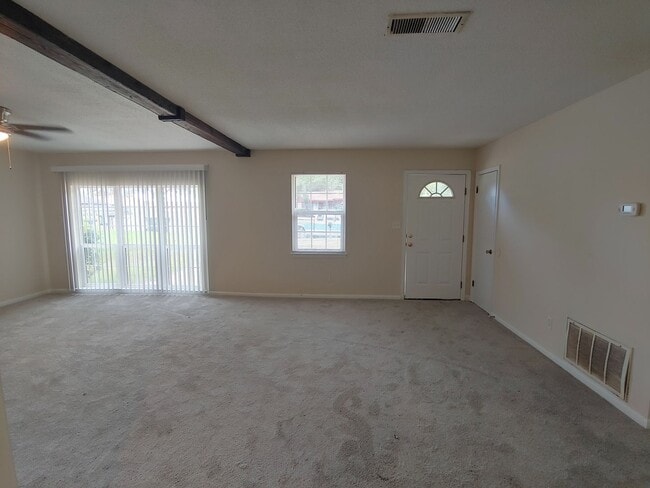 Building Photo - Nicely updated 3BR/1.5BA with fenced in ba...