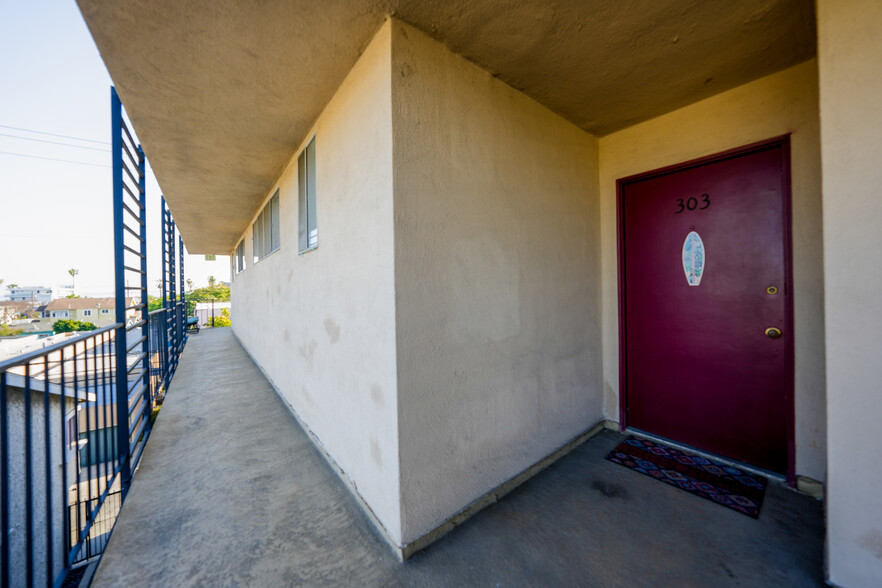 View and walkway to unit 303. - 1054 E 2nd St