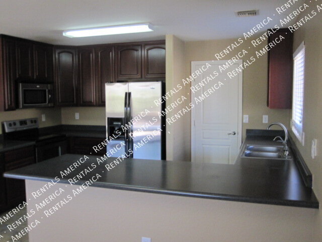 Building Photo - 12047 W Dos Rios Dr