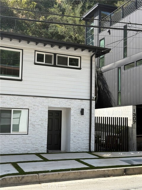 Building Photo - 1303 N Beverly Glen Blvd