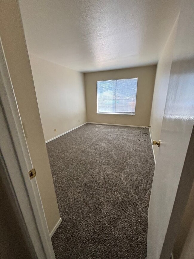 Building Photo - Spacious 4-Bedroom Home with Community Poo...