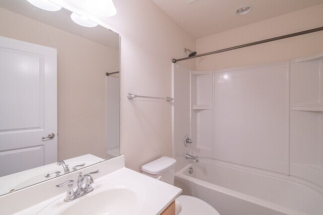 Building Photo - Spacious 4-Bedroom Home with Sunroom, Deck...