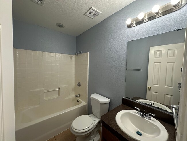 Building Photo - Spacious 4-Bedroom, 2-Bathroom Home for Re...