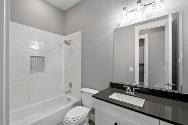 Building Photo - Modern Living Meets Small-Town Texas Charm