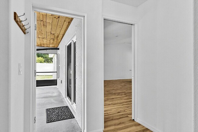 Building Photo - Modern 4-Bedroom, 3-Bath Home with Private In-Law Suite – Palm Coast, FL