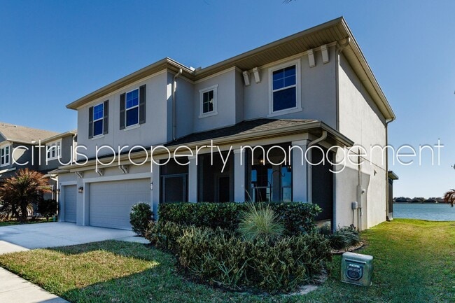 Building Photo - Stunning Double Waterfront 4/3 Home with Dock and Electric Boat Lift