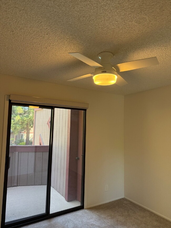 Building Photo - Spacious 3-Bedroom, 2-Bath Multi-Level Home with Balcony, In-Unit Laundry & Dual Parking