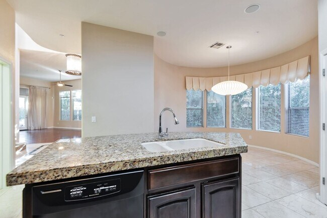 Building Photo - Experience luxury living in the prestigious Gainey Village!