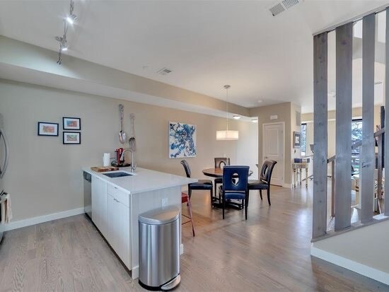 Open concept kitchen and living room - 3215 W 17th Ave
