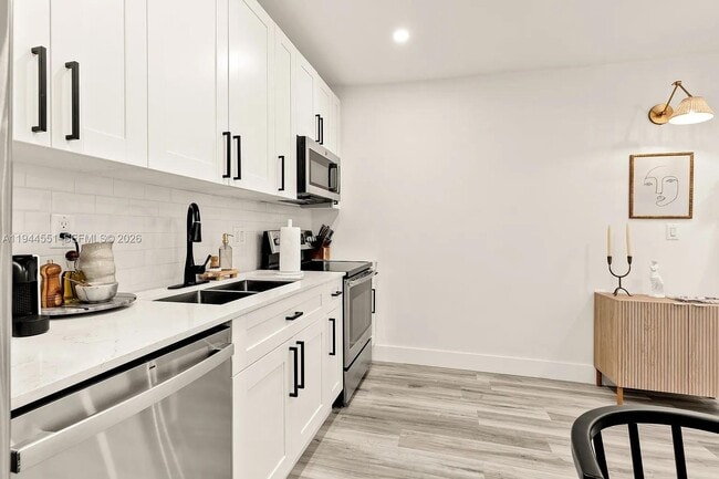 Building Photo - 1237 NW 33rd Ave