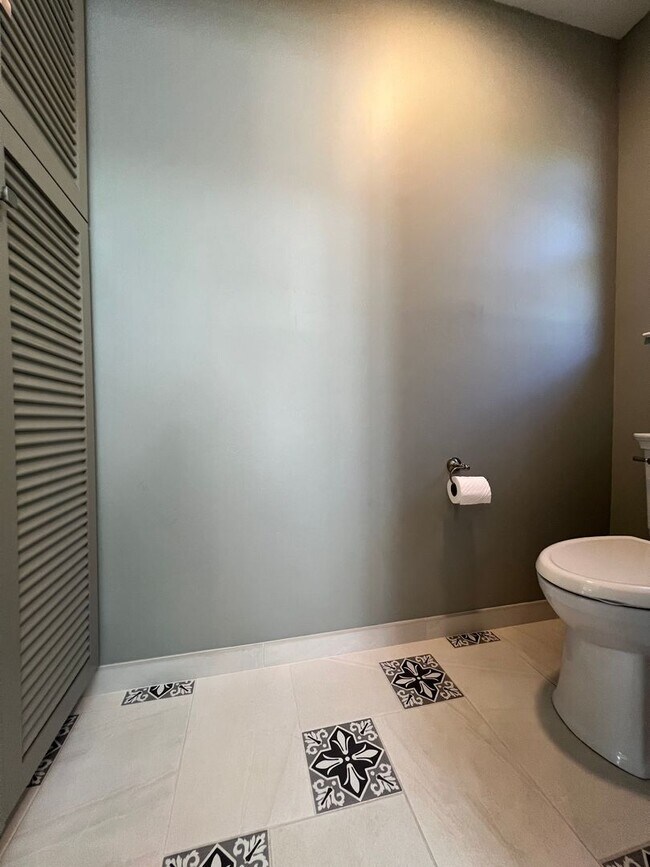 Building Photo - Spacious 4-Bedroom Retreat Just Steps from...