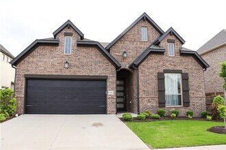 Building Photo - Classic Brick Home with Spacious Living & Outdoor Space