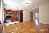 Building Photo - Charming 2-Bedroom Apartment with Roof Acc...