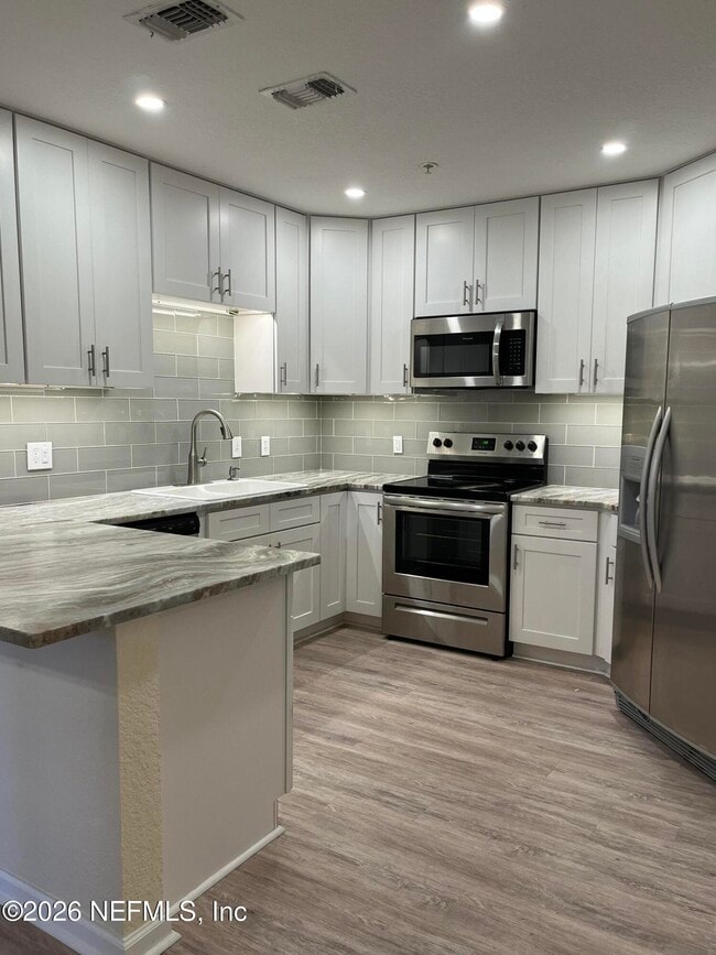 Building Photo - 1701 The Greens Way