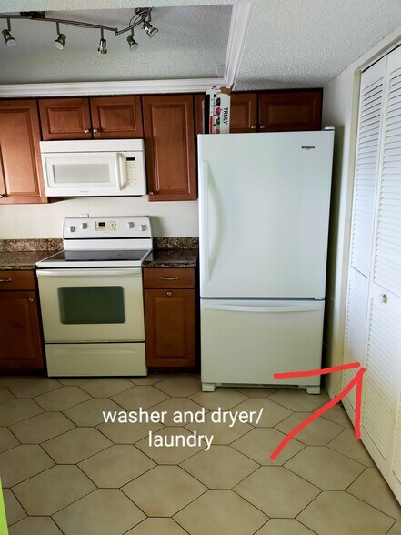 Laundry room right of refrigerator - 7432 Sunshine Skyway Ln S