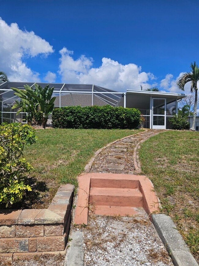 Building Photo - Port Charlotte Waterfront salt water pool annual rental
