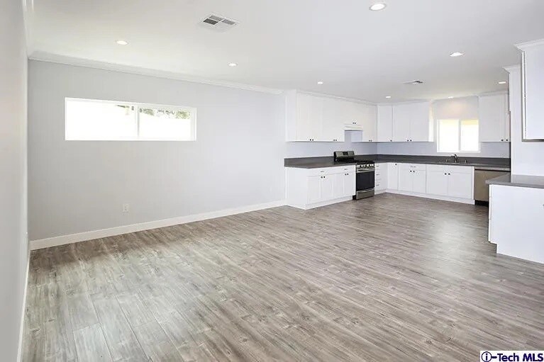 Building Photo - 7435 Collett Ave