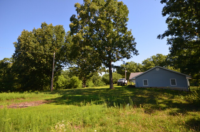 Building Photo - 12231 N Dripping Springs Rd