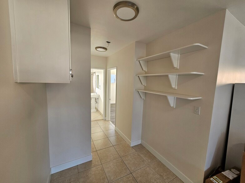 Hall and Storage - 25515 Senator Ave