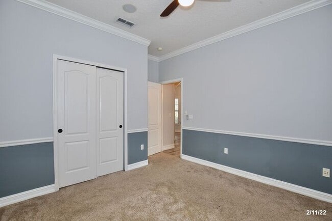 Building Photo - Luxurious 4/3 Waterfront Home with an In-ground Spa, an In-law Suite and a 2 Car Garage in the Hi...