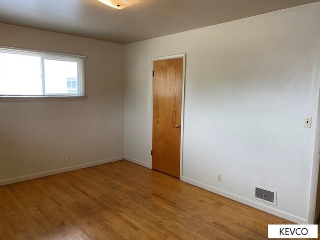 Building Photo - Massive Three Bedroom Home with Yard!
