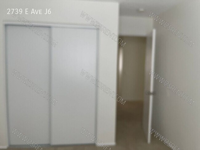 Building Photo - 2739 E Ave J6