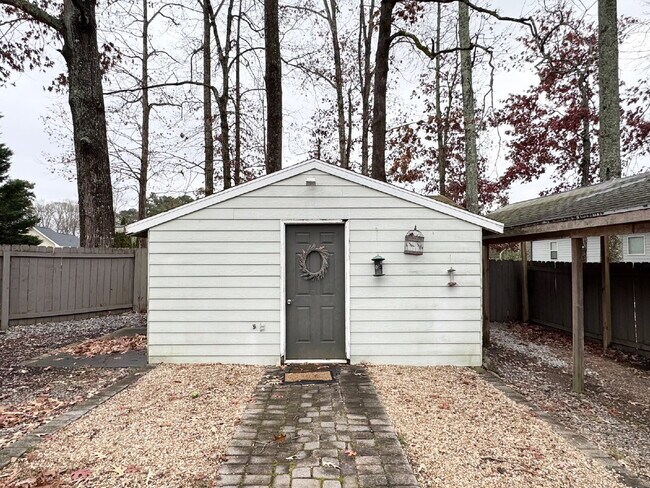 Building Photo - Rare Sugar Hill Rental with Huge Fenced Yard and Outdoor Living Space