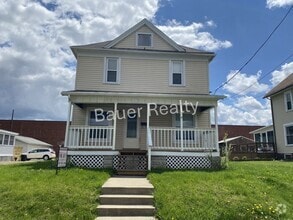 Building Photo - Three Bedrooms, One and a Half Baths