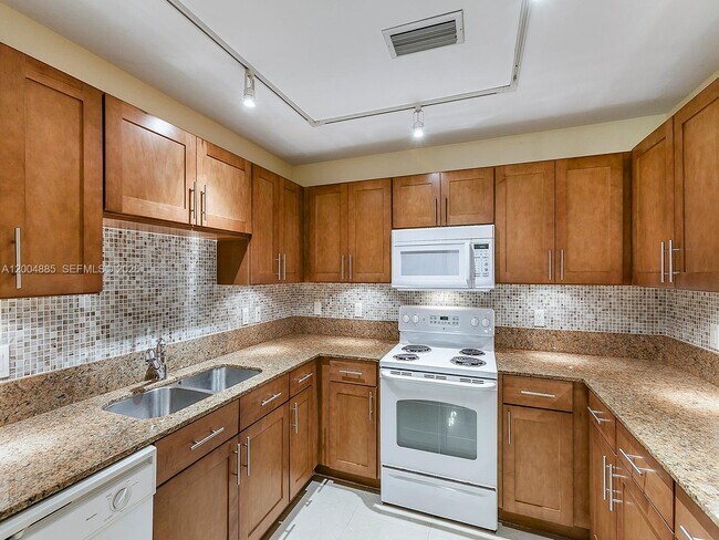 Building Photo - 8390 SW 72nd Ave