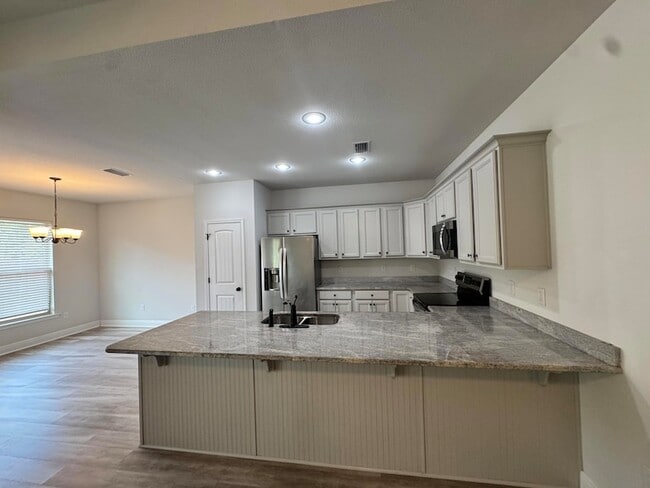 Building Photo - 5723 Maggie Rose Cir