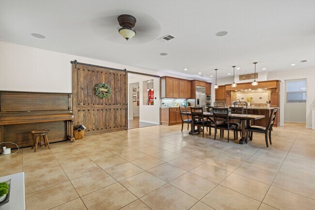 Building Photo - Luxurious 5-Bedroom Pool Home with Solar &...