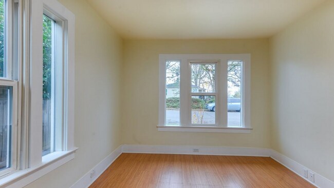 Building Photo - Charming 2 Bedroom 1 Bathroom Bungalow with Oversized 1 Car Garage and Large Manicured  Backyard ...