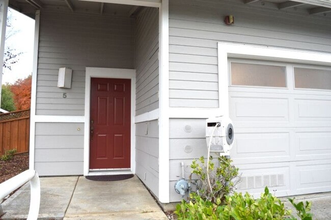 Building Photo - Spacious Three-Bedroom Two-Story Townhome with Garage and Private Yard