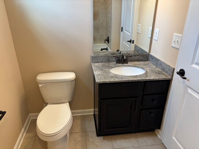 Building Photo - Beautiful End Unit Townhome in the McCarle...