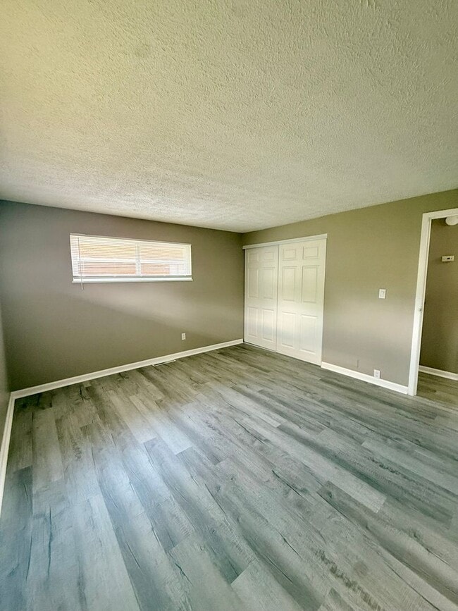 Building Photo - Move-In Ready 2BR with Stunning Granite + Fenced Backyard