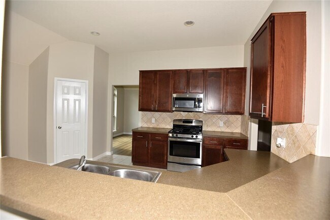 Building Photo - 9944 Western Ridge Way