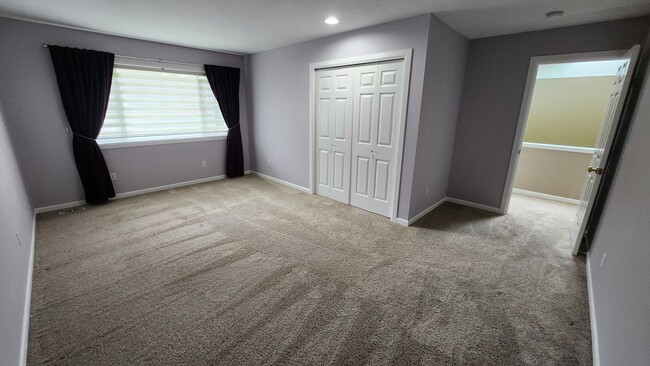 Bedroom 2 upstairs is huge with space for a king size bed and furniture - 7409 245th Way NE