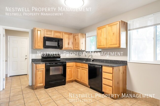 Building Photo - FREE 1ST MONTH'S RENT - Remodeled 2-bed Un...