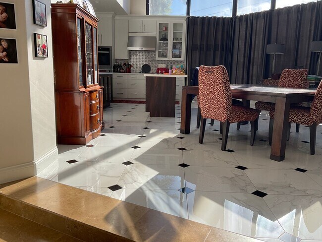 Building Photo - Spacious and Furnished 9 Bedroom House Nea...