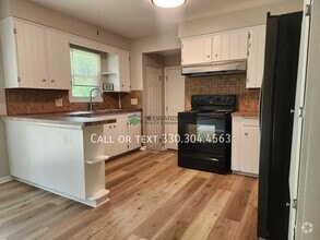 Building Photo - 8250 E Wadora Cir NW