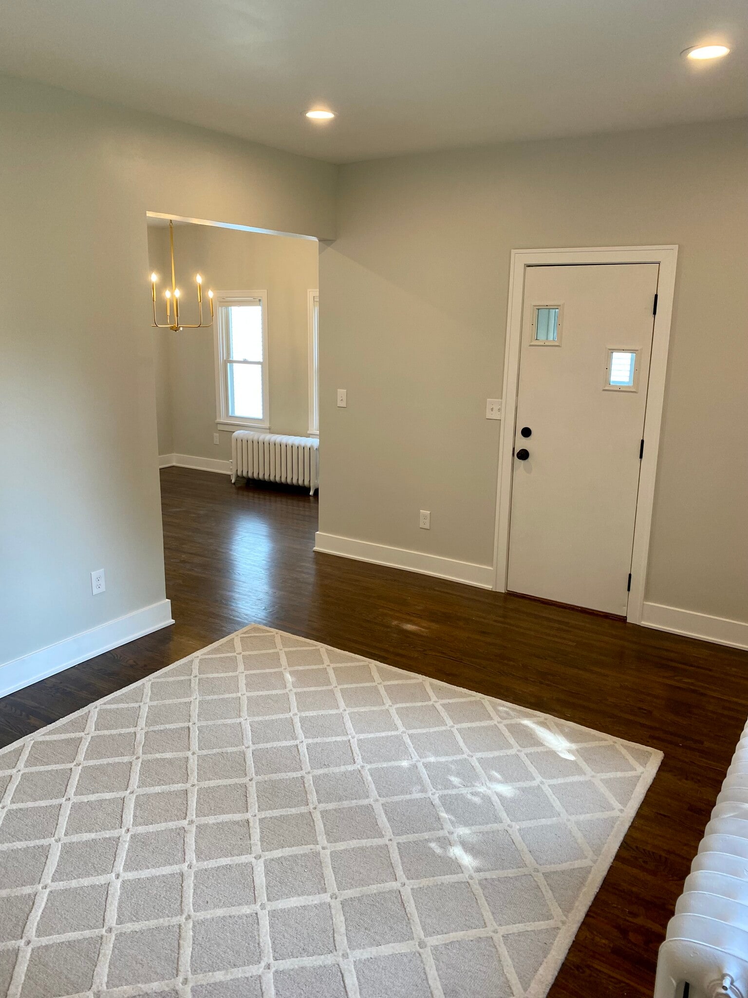 Living room with view to dining room - 401 Sherburne Ave