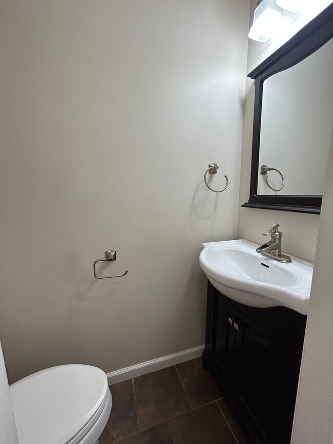 Building Photo - Space, Style - Move-In Ready 4-Bedroom End Unit with Finished Basement & Garage