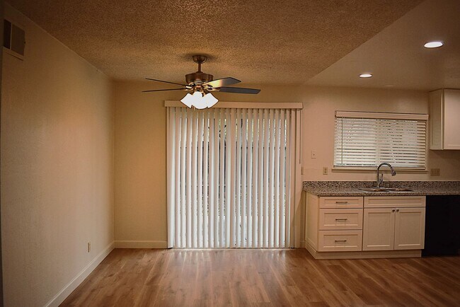 Building Photo - 4-bedroom home with luxury vinyl flooring and much more!