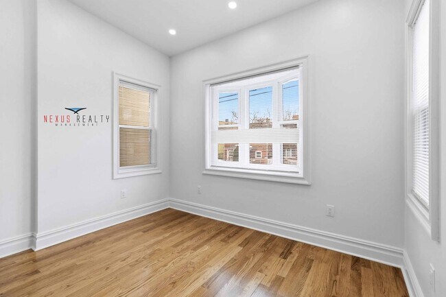 Building Photo - 21-28-28 48th St