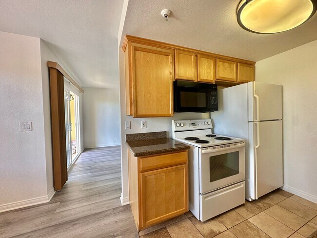 Building Photo - Updated Crown Point Condo With Wood Style ...